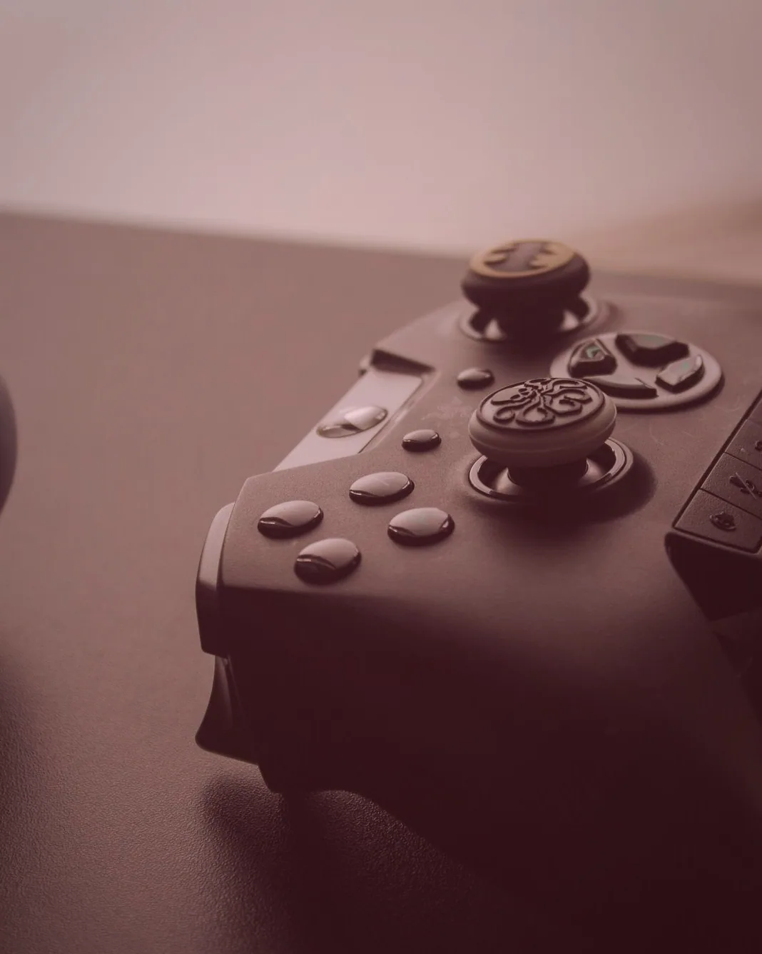Two players on a sofa with controllers, looking at a screen during a console afternoon